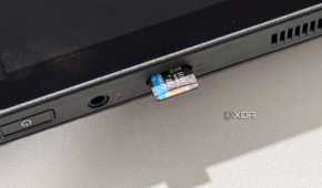 rog ally x microsd card slot with a storage card half inserted