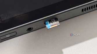rog ally x microsd card slot with a storage card half inserted