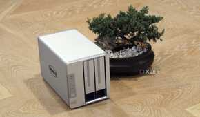 TerraMaster F2-423 NAS on a table next to a bonsai