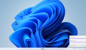 Screenshot of WIndows 11 with the Twinkle Tray flyout showing brightness sliders for two monitors