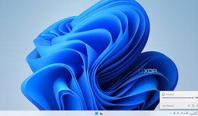 Screenshot of a Windows 11 desktop with a unified slider for all connected displays in the Twinkle Tray flyout