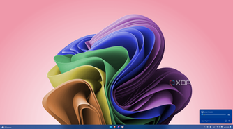 Screenshot of Windows 11 with a Twinkle Tray flyout showing a brightness slider for an external monitor