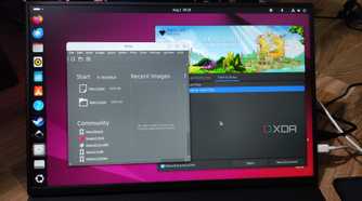 A Uperfect UGame K118 monitor displaying the Inkscape and Krita UI