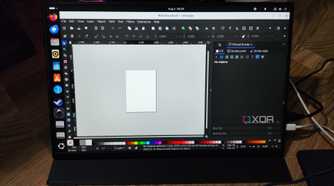 A Uperfect UGame K118 monitor displaying the Inkscape UI