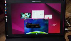 A Uperfect UGame K118 displaying the 7 Days to Die initialization screen, Ubuntu error message, Settings app, and Starbound
