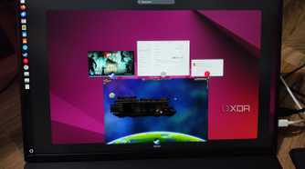 A Uperfect UGame K118 displaying the 7 Days to Die initialization screen, Ubuntu error message, Settings app, and Starbound