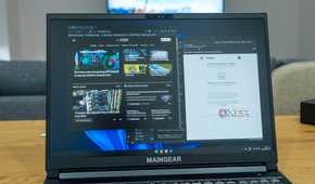 A Windows 11 laptop running Brave browser and Mozilla Thunderbird