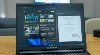 A Windows 11 laptop running Brave browser and Mozilla Thunderbird