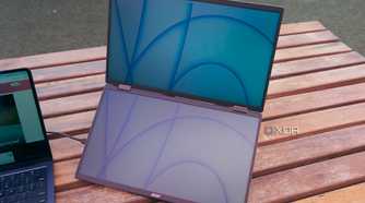 The Acer dual portable monitor on a wooden table.