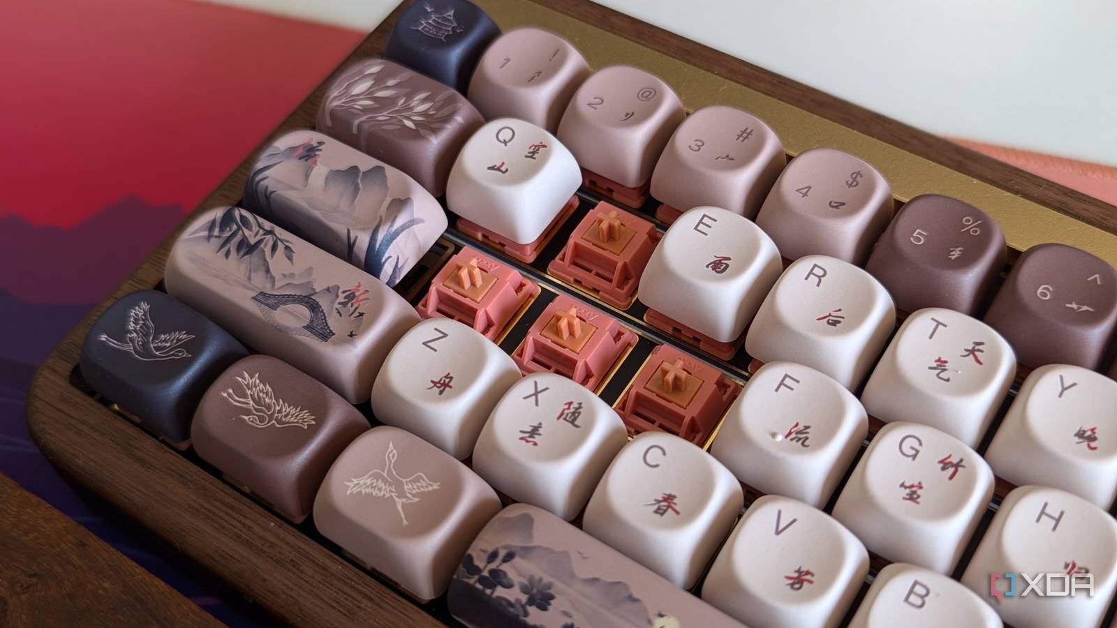 Close-up of a wooden mechanical keyboard showing switches and keycaps