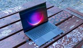 Angled view of the Asus Zenbook S 14 showing the Windows 11 desktop