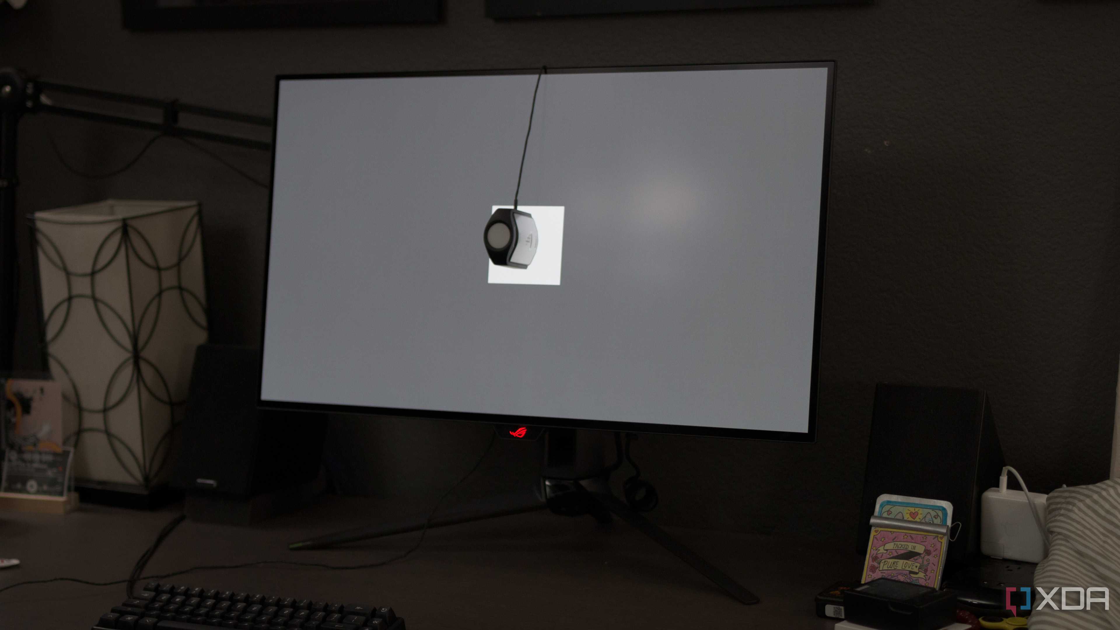 Measuring screen luminance on the ASUS ROG PG32UCDP.