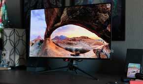 A scenic wallpaper shown on the ASUS ROG PG32UCDP