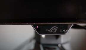 The proximity sensor on the chin of the ASUS ROG PG32UCDP.
