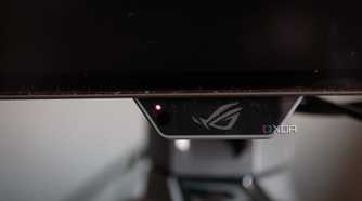 The proximity sensor on the chin of the ASUS ROG PG32UCDP.