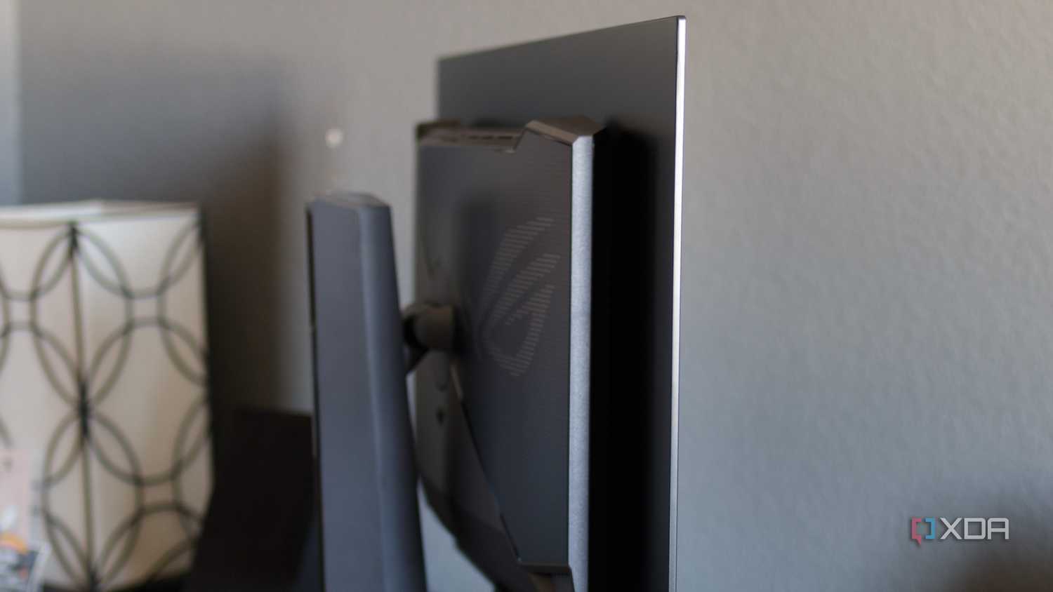 A side view of the ASUS ROG PG32UCDP.