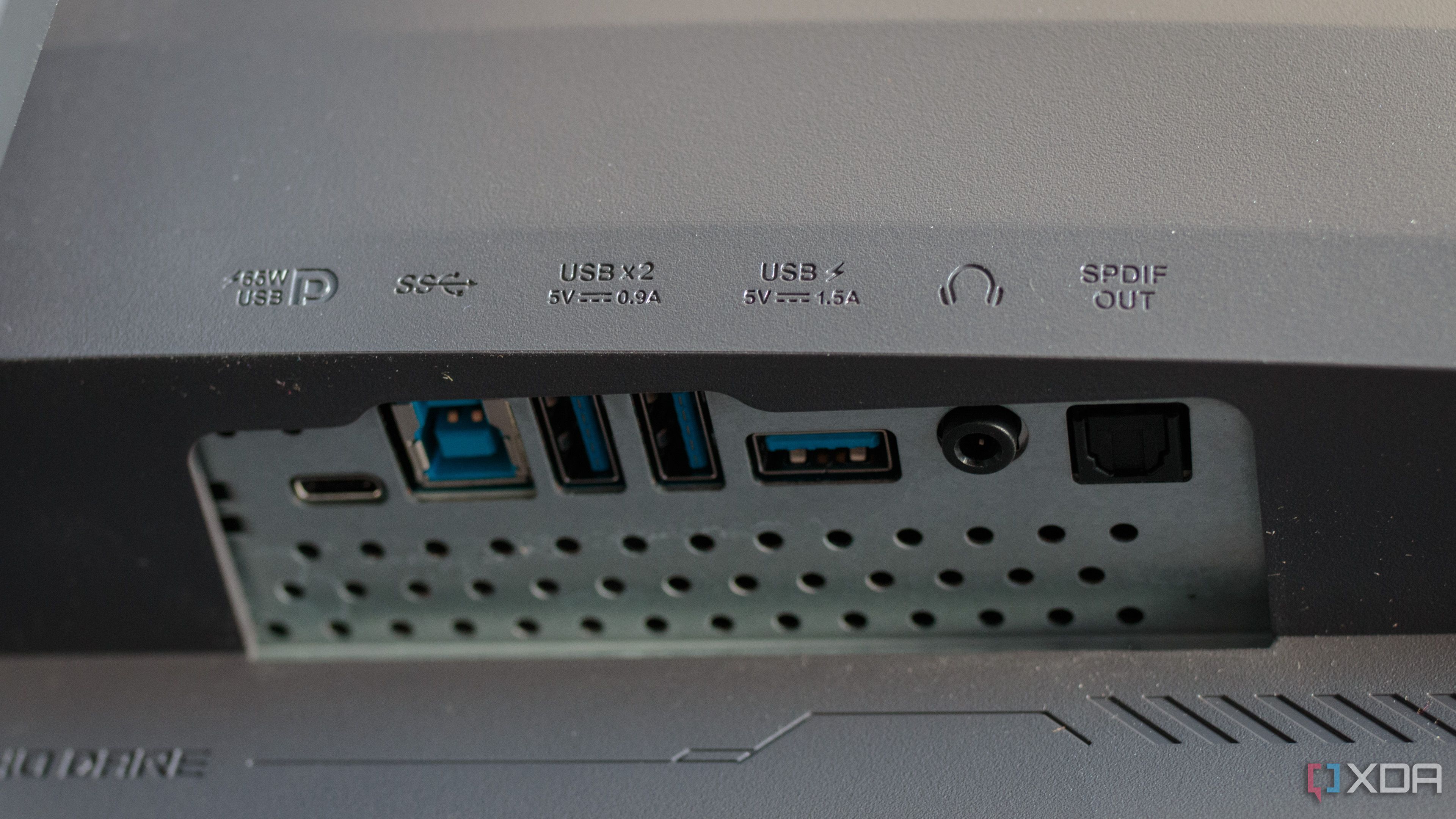 The USB and audio ports on the ASUS ROG PG32UCDP.