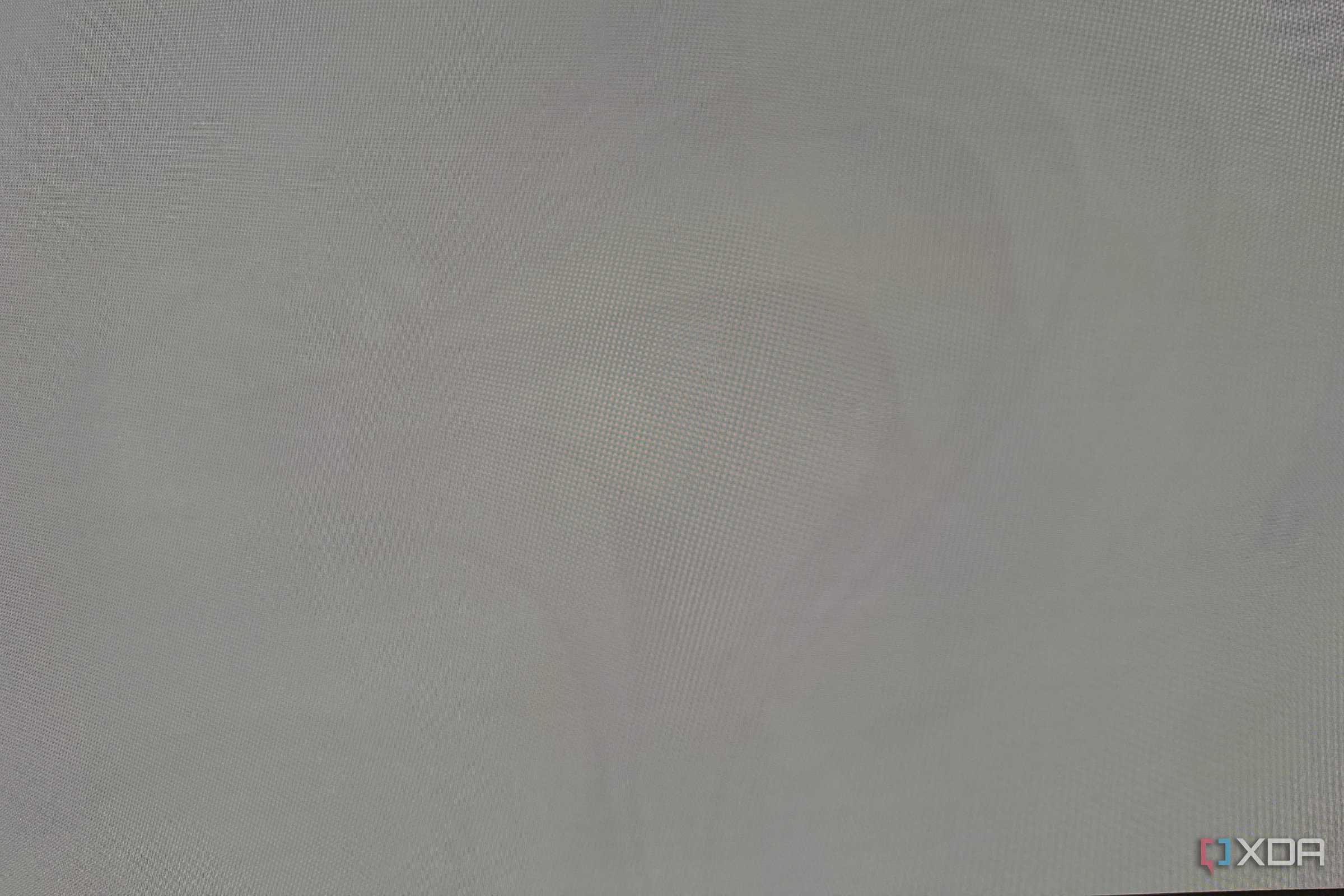 closeup of alienware qd-oled monitor showing burn-in