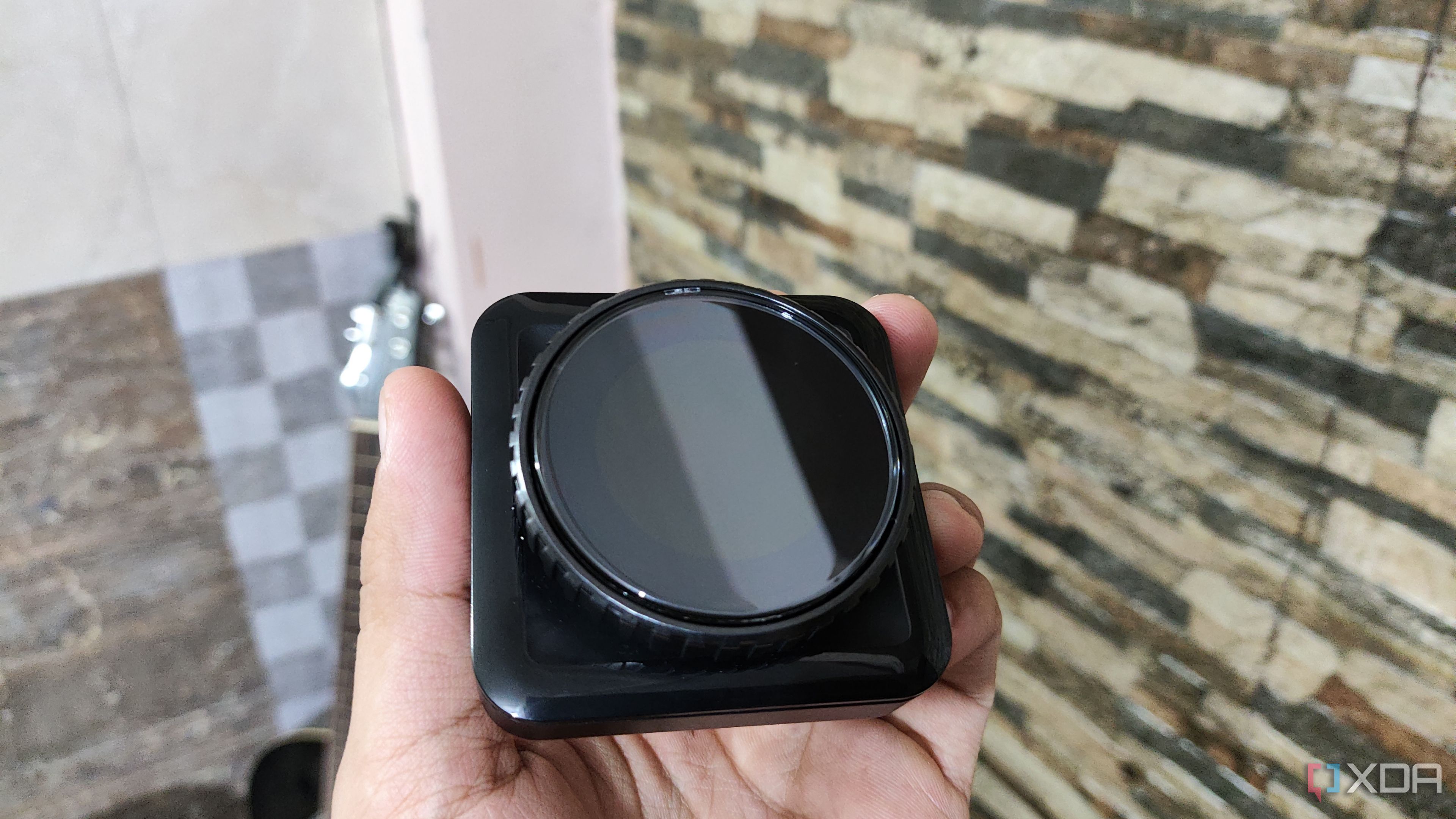 A person holding the 1.3-inch IPS Display module of the Cooler Master MasterHUB