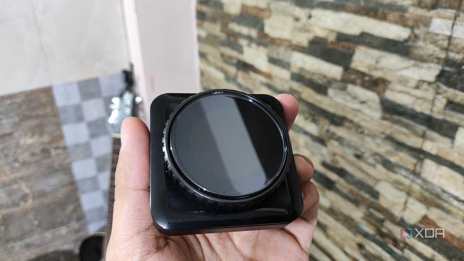 A person holding the 1.3-inch IPS Display module of the Cooler Master MasterHUB