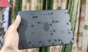 A person holding the FlexBase of the Cooler Master MasterHUB