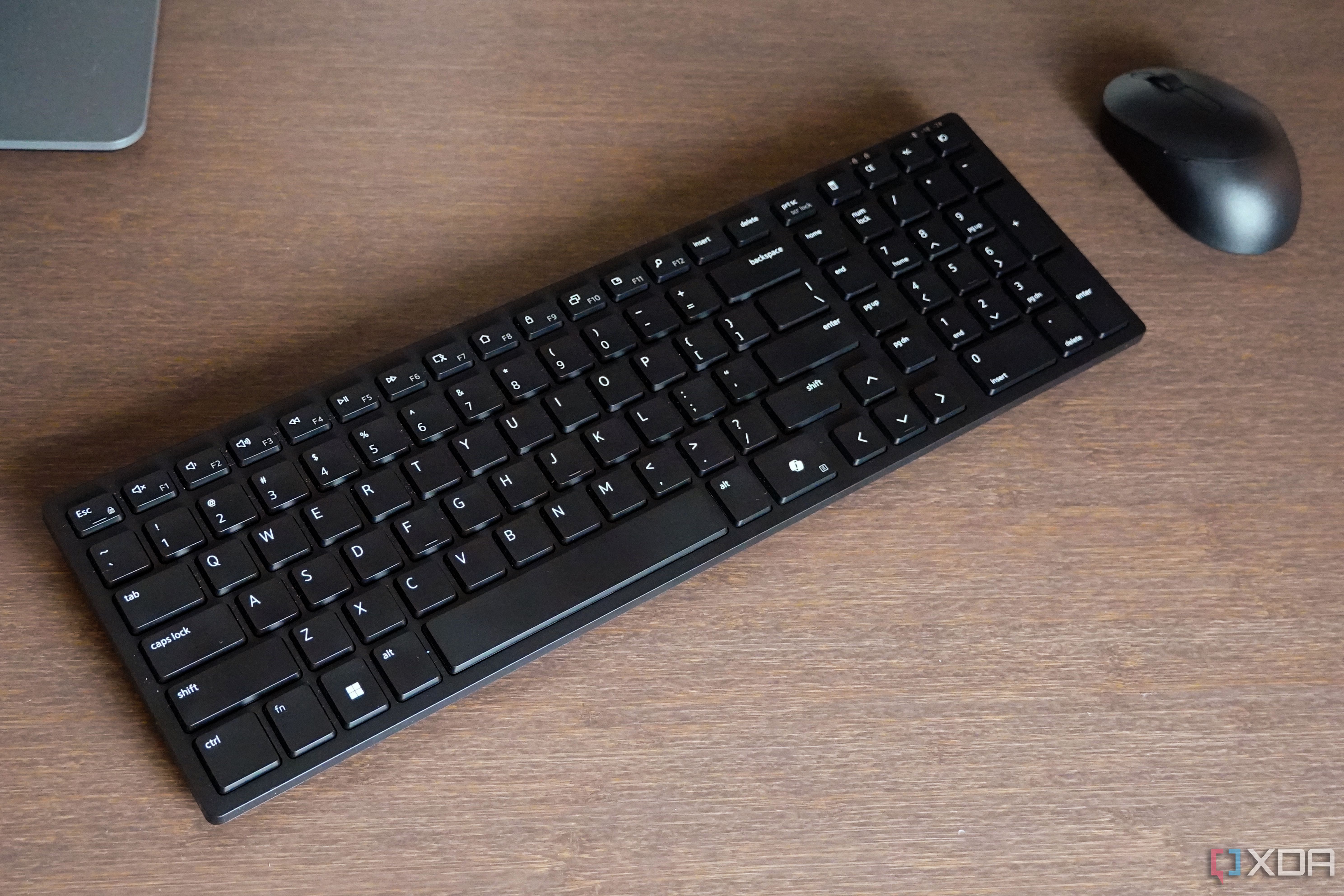 The Dell KM555 mouse and keyboard on a desk.