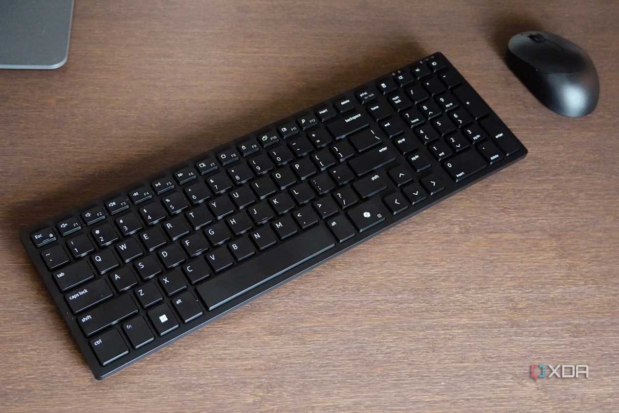 The Dell KM555 mouse and keyboard on a desk.