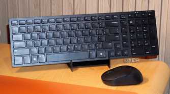 The Dell KM555 keyboard on a stand.