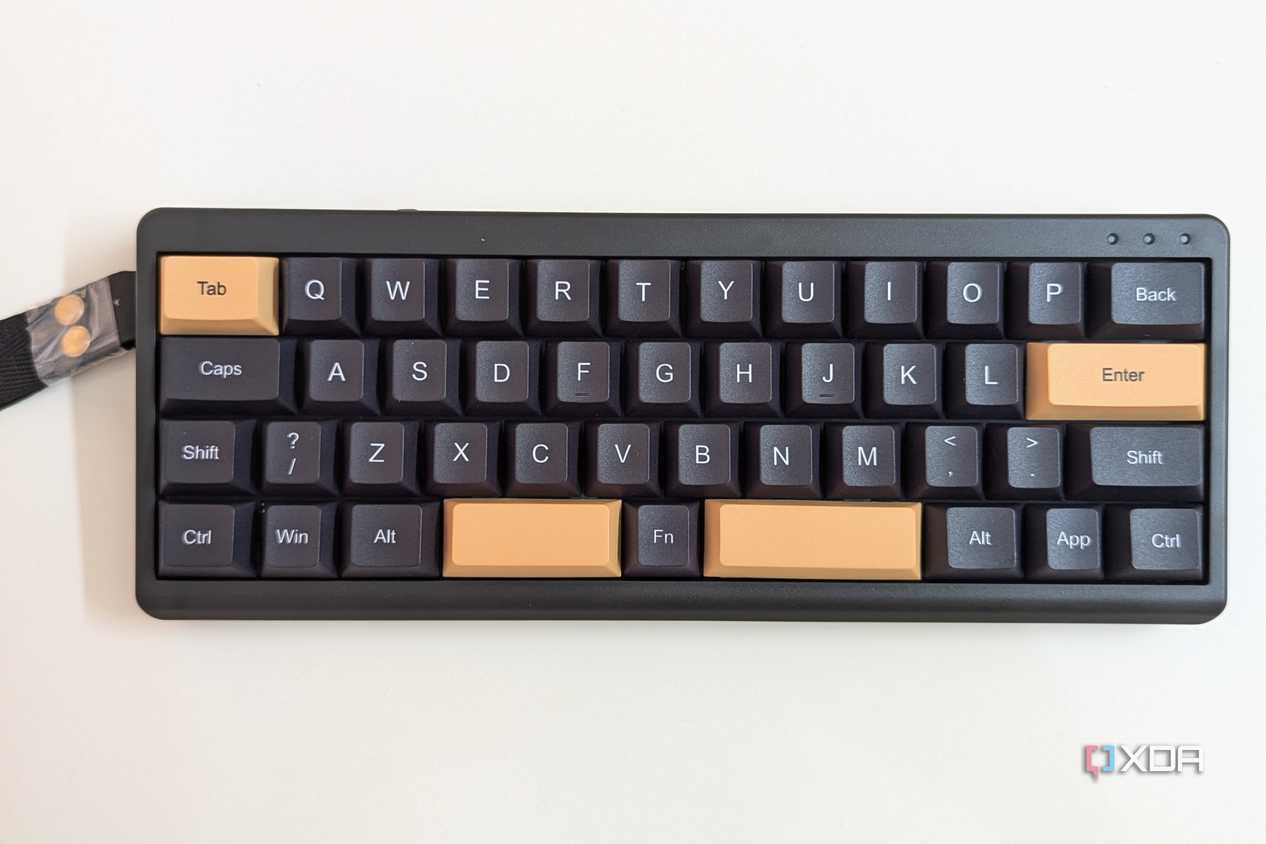 Top view of a black mechanical keyboard on a white surface