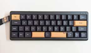 Top view of a black mechanical keyboard on a white surface