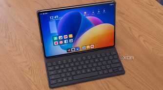 Angled view of the Honor MagicPad 2 inside the Smart Keyboard accessory, displaying the Home screen