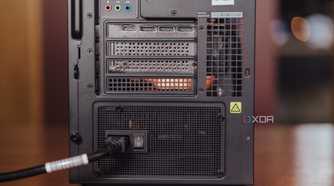 Rear-facing switch on a power supply installed in a tower-style PC case