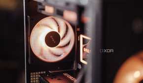 Rear-mounted exhaust fan on a PC glowing orange