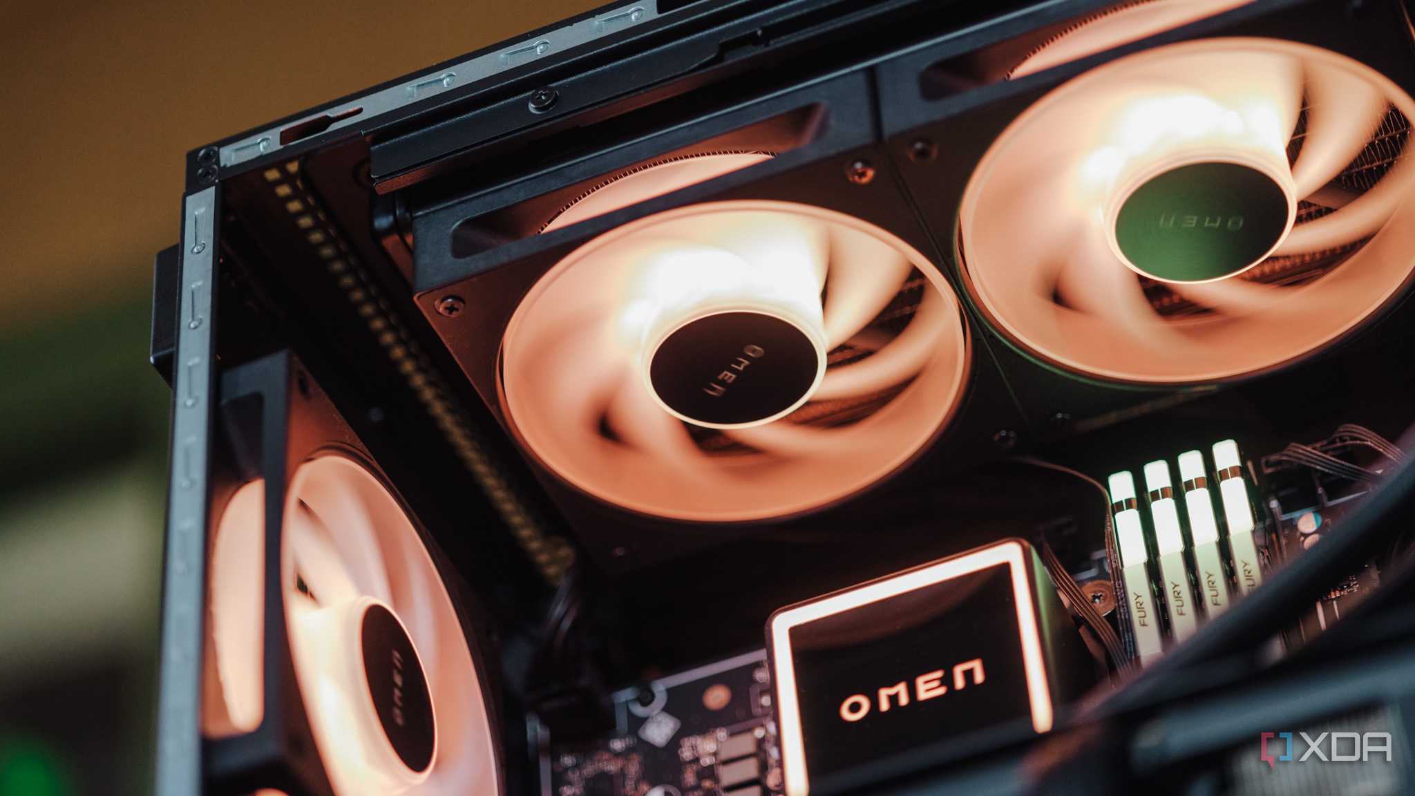 cooling fans attached to an AIO radiator glowing pale orange