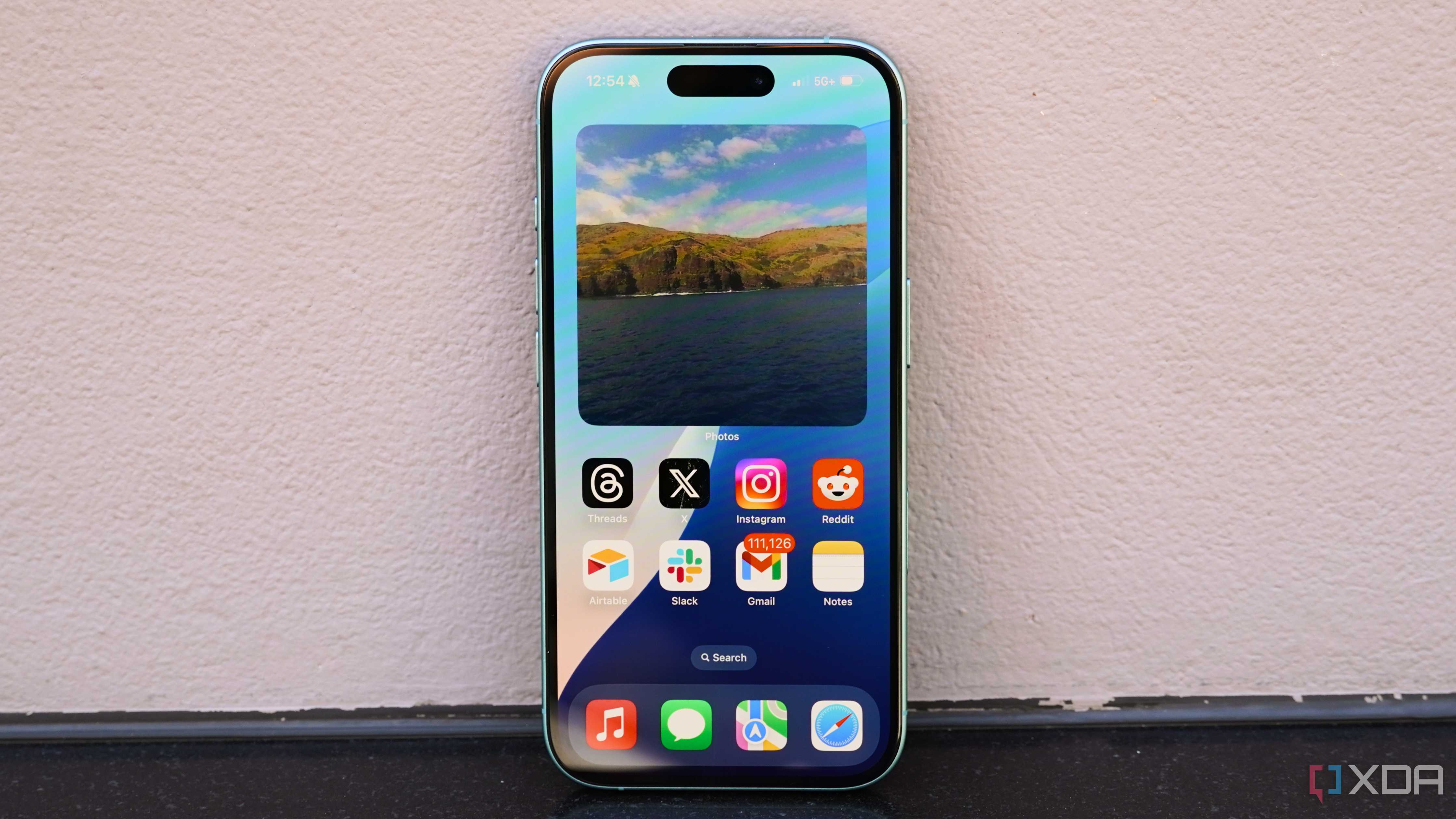 A home screen on iOS 18 on an iPhone 16.