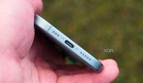 The USB-C port on the bottom of the iPhone 16.