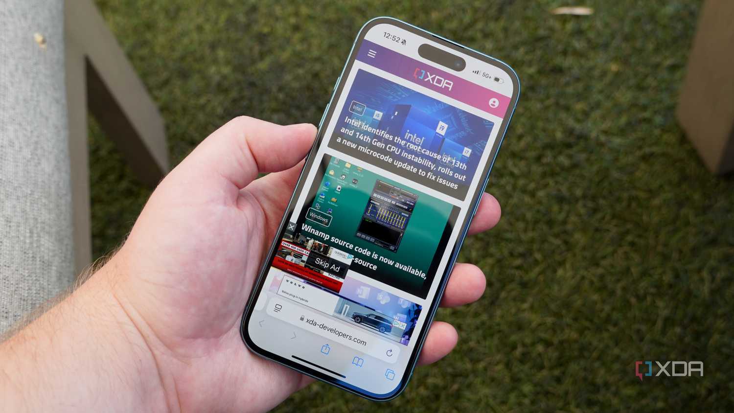 The XDA homepage opened up on the iPhone 16.