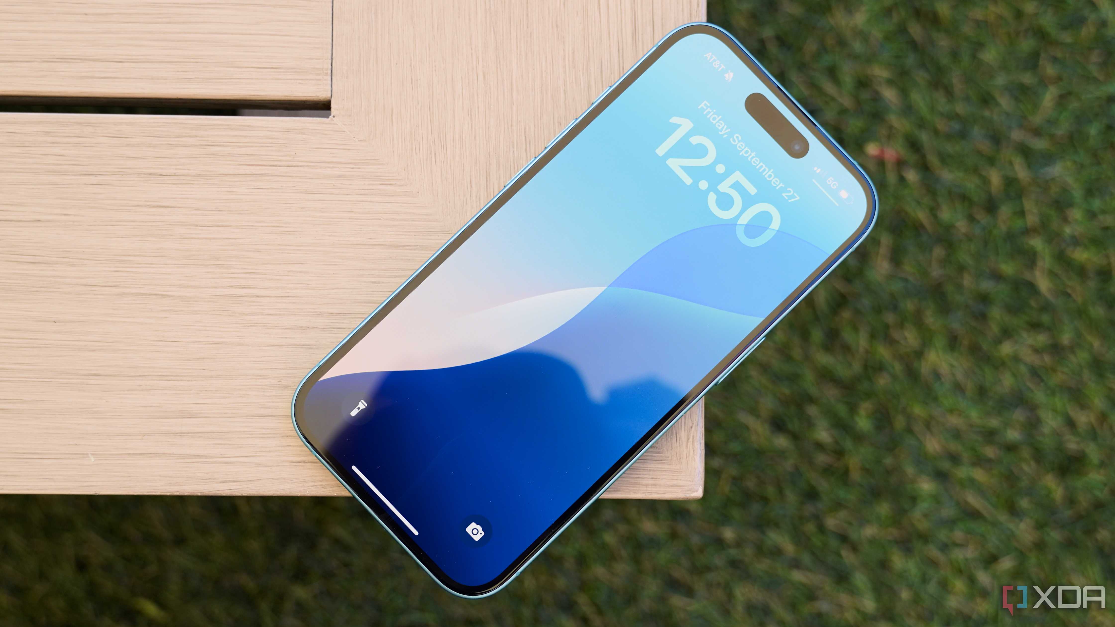 The iPhone 16 display on a table.