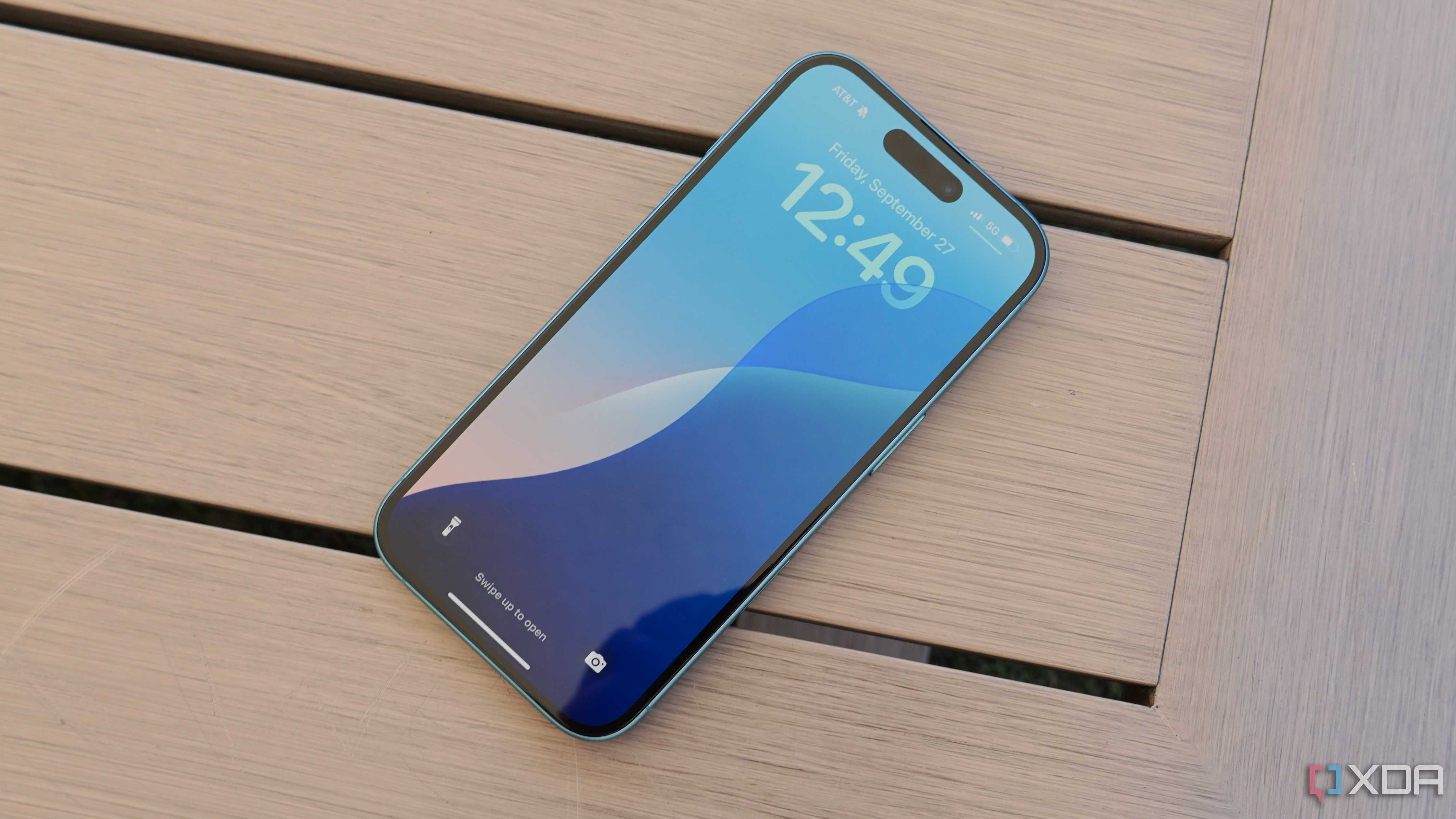 The iPhone 16 Lock Screen on a table.