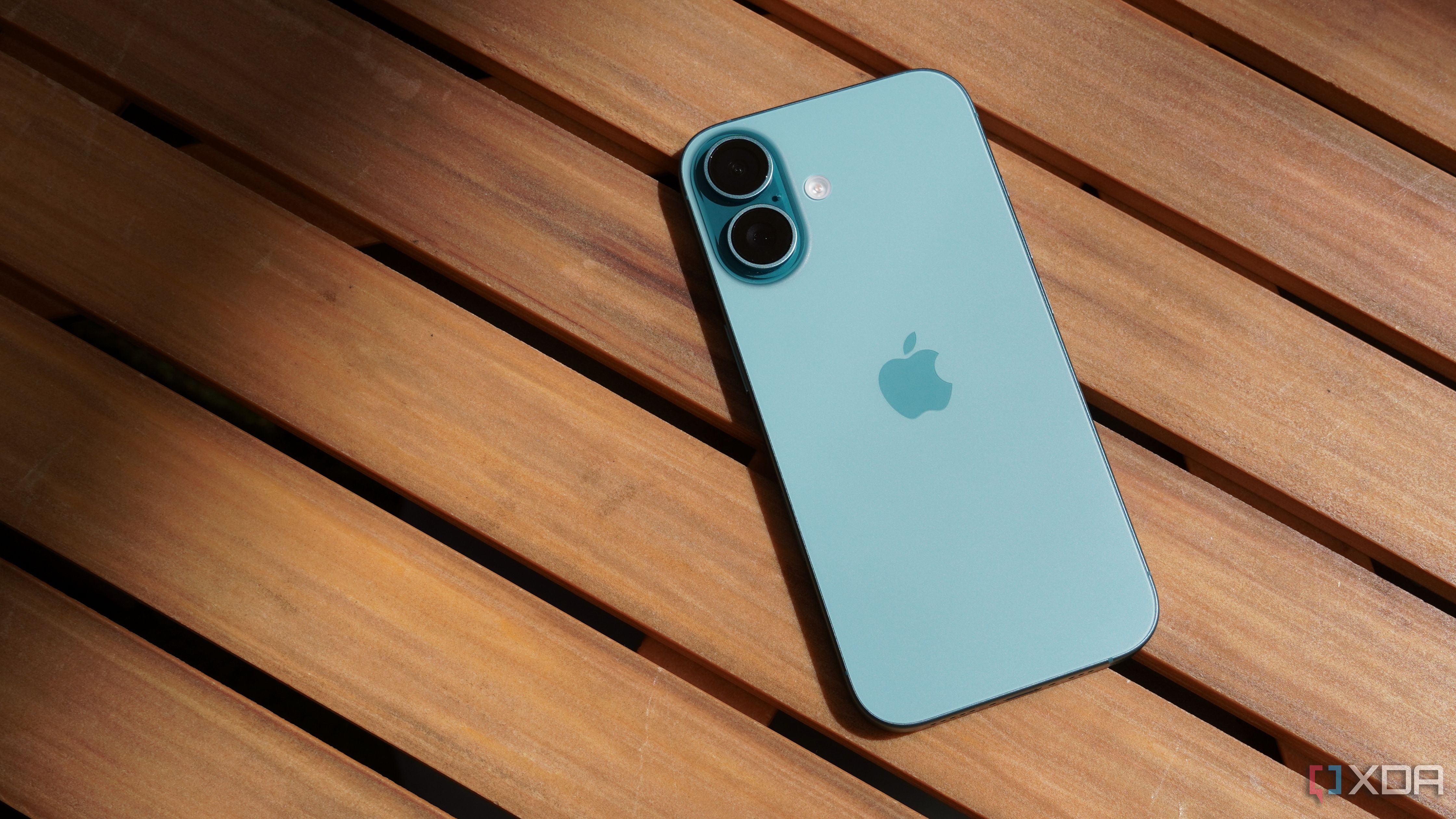 The iPhone 16 on a table.