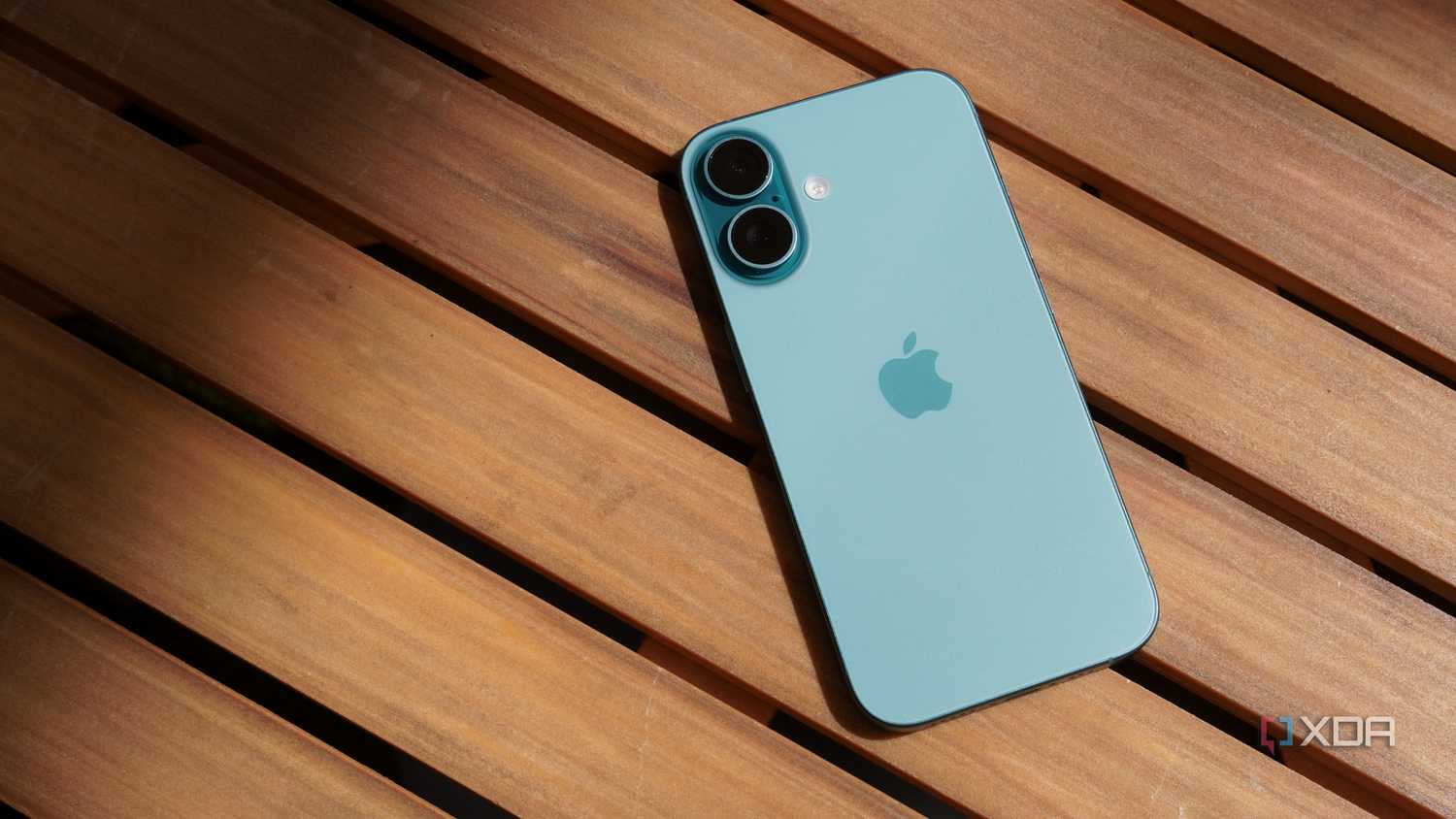 The iPhone 16 on a table.