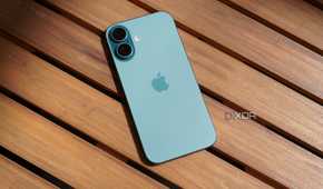 The iPhone 16 on a table outdoors.
