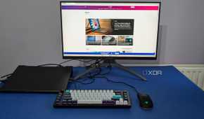 image of laptop lid closed while using external monitor with peripherals featured image