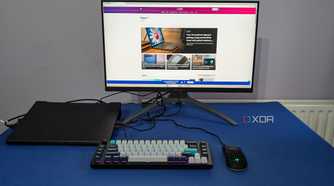 image of laptop lid closed while using external monitor with peripherals featured image
