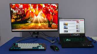 image of laptop lid open extending screen to external monitor