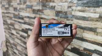 A person holding a 16GB RipJaws SODIMM memory module