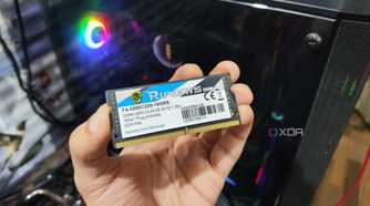 A person holding a 16GB RipJaws SODIMM memory module
