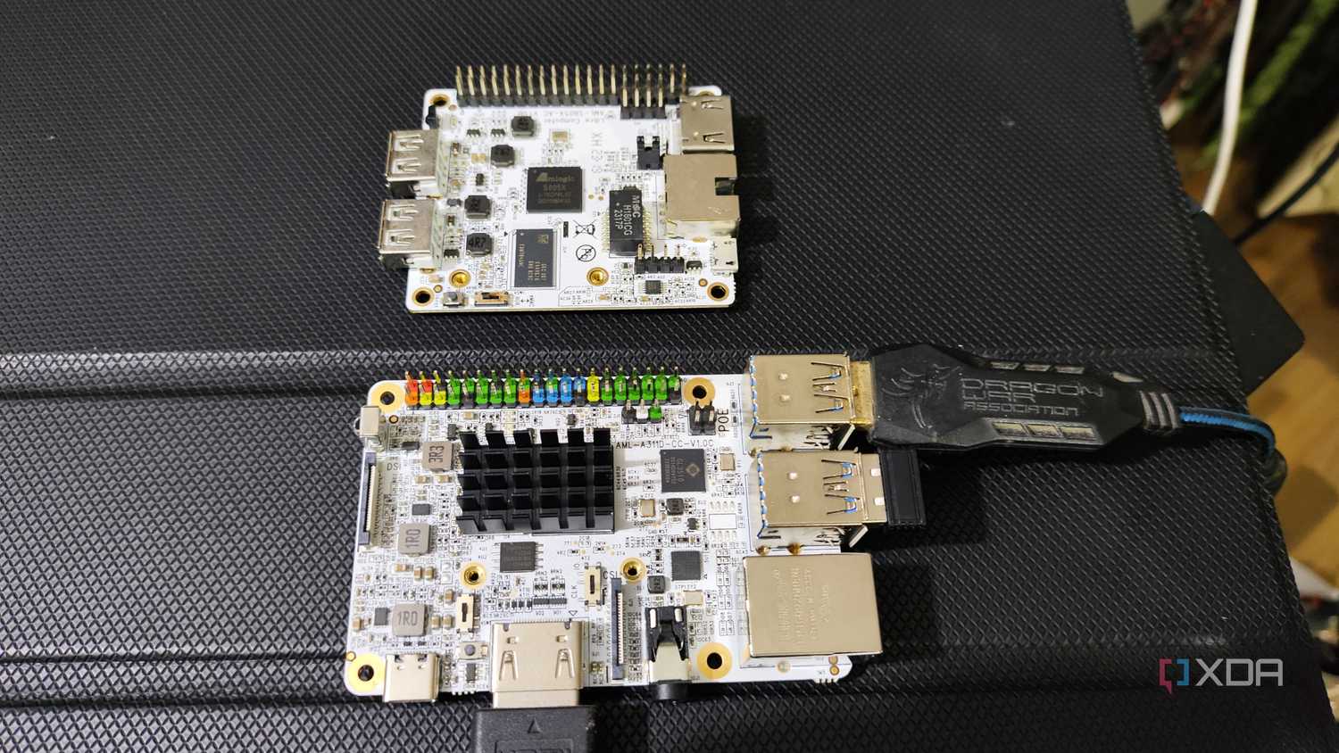 A Libre Computer La Frite AML-S805X-AC SBC placed near an Alta AML-A311D-CC AI SBC