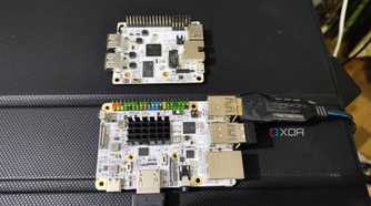 A Libre Computer La Frite AML-S805X-AC SBC placed near an Alta AML-A311D-CC AI SBC