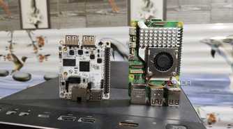 A Libre Computer La Frite AML-S805X-AC SBC placed near a Raspberry Pi 5